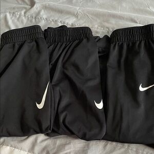 Nike Kids Black Sweatpants with White Logo